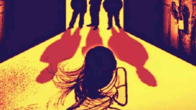 Photo of Another Woman Being Gang-Raped in Front of Her Children